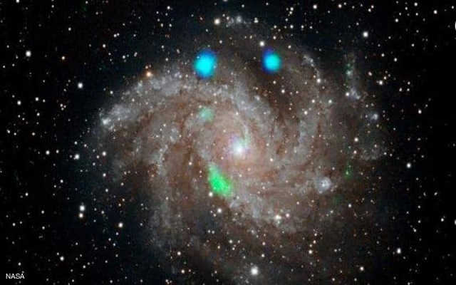 اكتشاف أضواء لامعة غامضة في مجرة بعيدة...