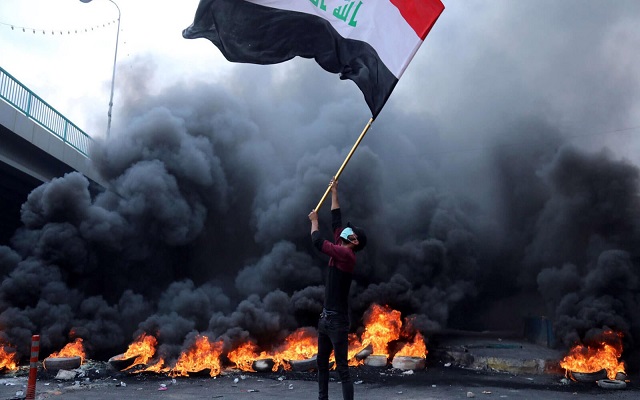 بعد إحراق القنصلية الإيرانية بالنجف قوات الأمن العراقية تقتل 28 محتجا
