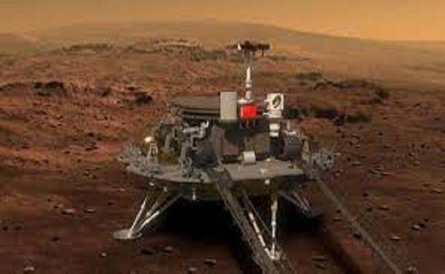 المسبار الصيني يرسل صورة للقمر الأول لكوكب المريخ...
