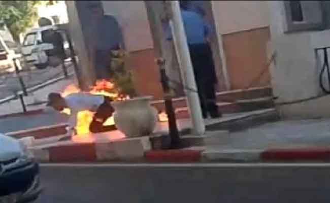 تفاصيل حادثة إضرام شخص النار في جسده أمام مقر وزارة العدل